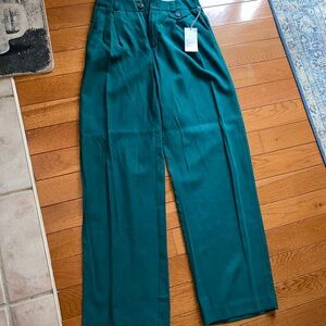Beautiful Teal pleated trousers with a relaxed fit